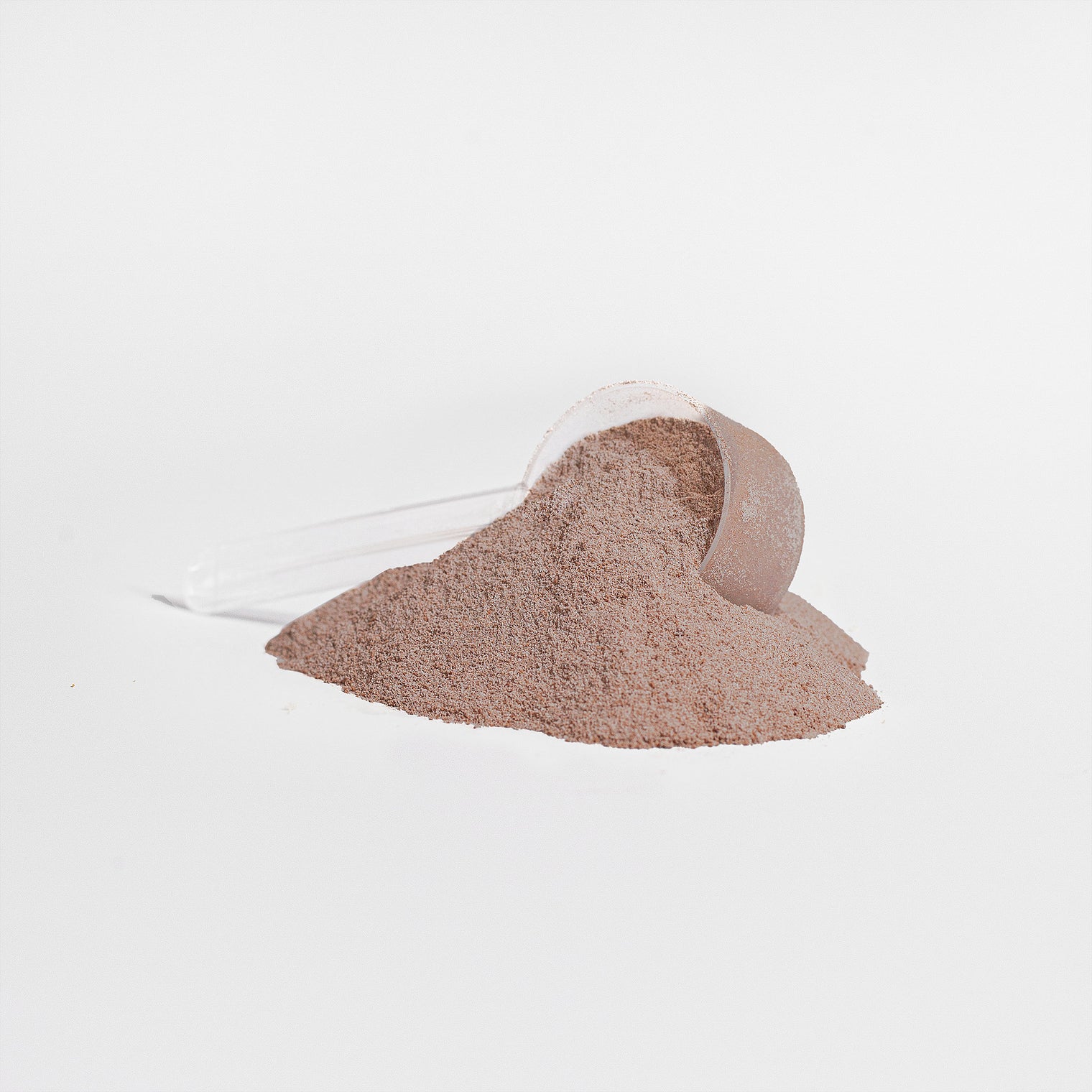 A scoop of Thrive Hive chocolate-flavored Whey Protein Isolate powder, showing its fine texture.