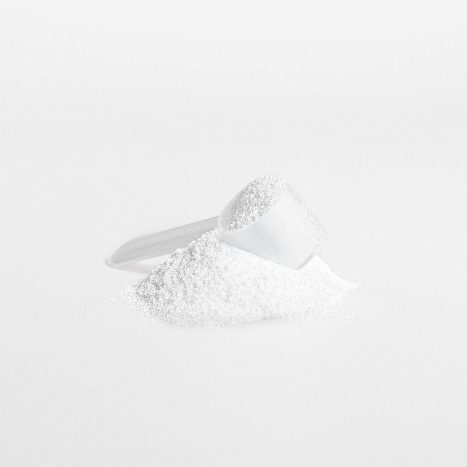 A scoop of pure Thrive Hive Creatine powder, a supplement to boost athletic performance.