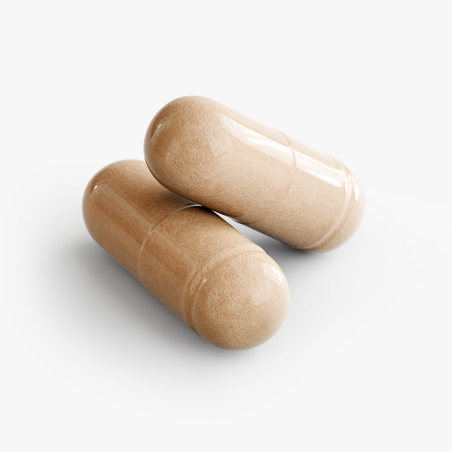 Close-up of Thrive Hive's Triple Maca Blend capsules, a natural supplement for hormonal balance.