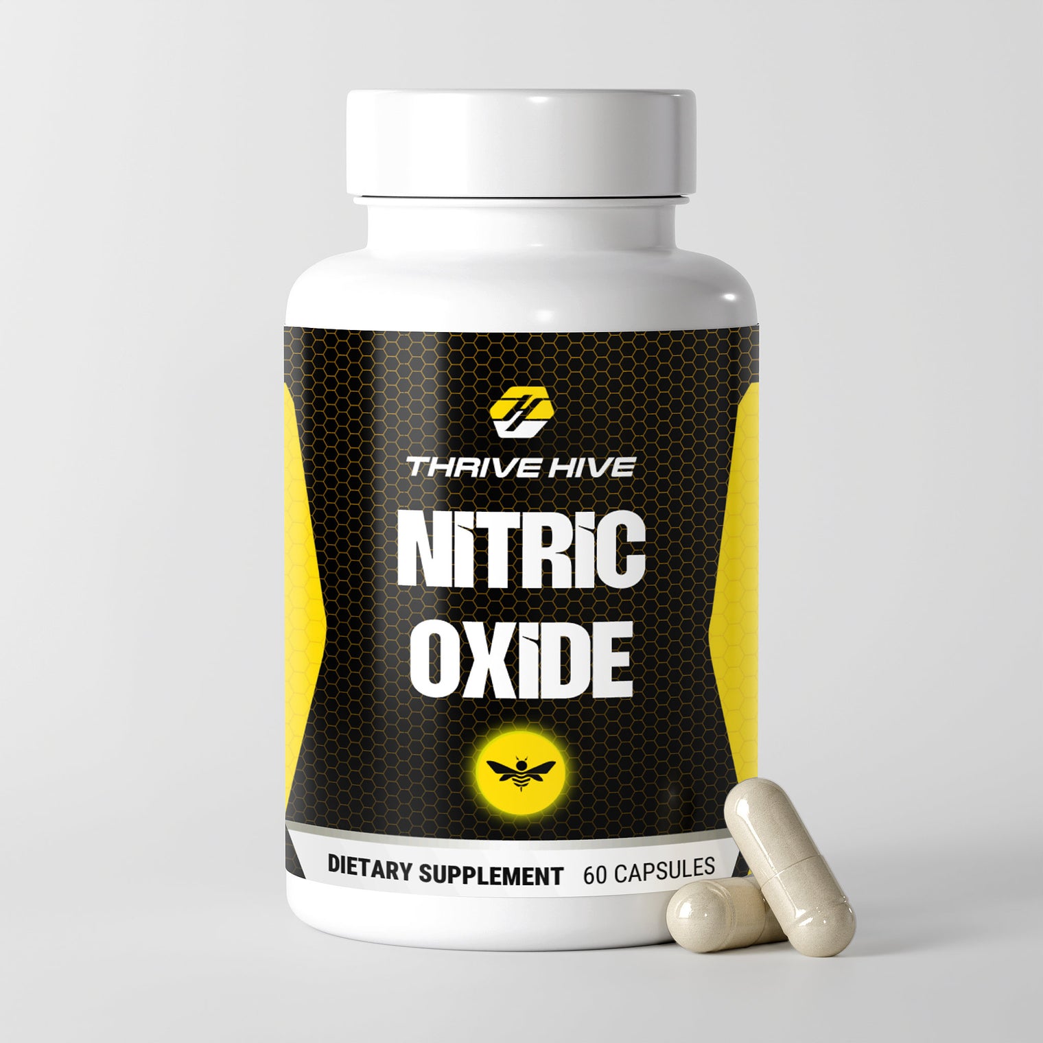 Close-up of a Thrive Hive Nitric Oxide capsule, an easy-to-take supplement for muscle growth.