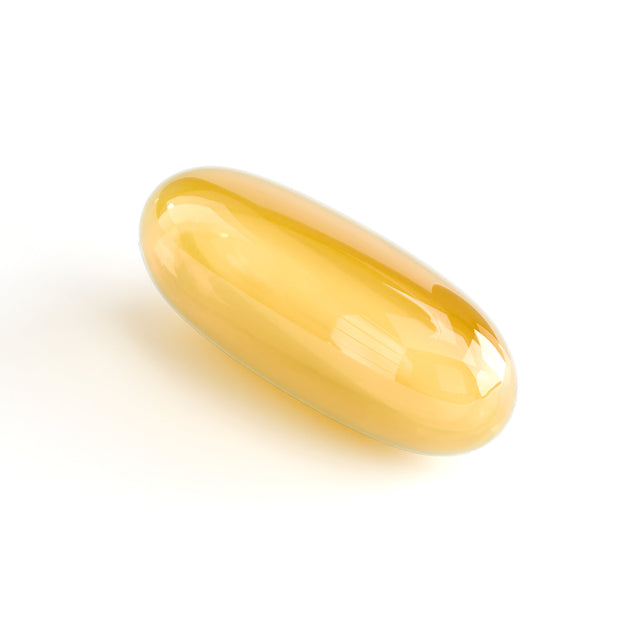 Close-up of a Thrive Hive Omega-3 softgel, a convenient way to get essential fish oil.