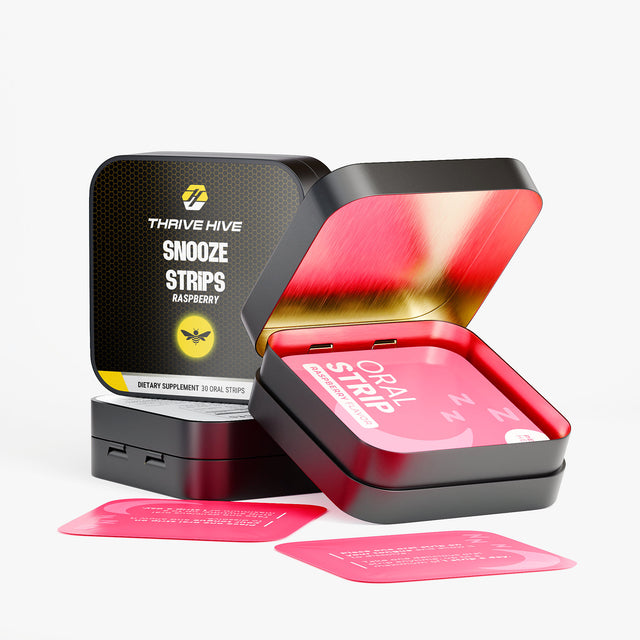 Close-up of Thrive Hive's raspberry-flavored Snooze Strip, a fast-acting melatonin oral strip.