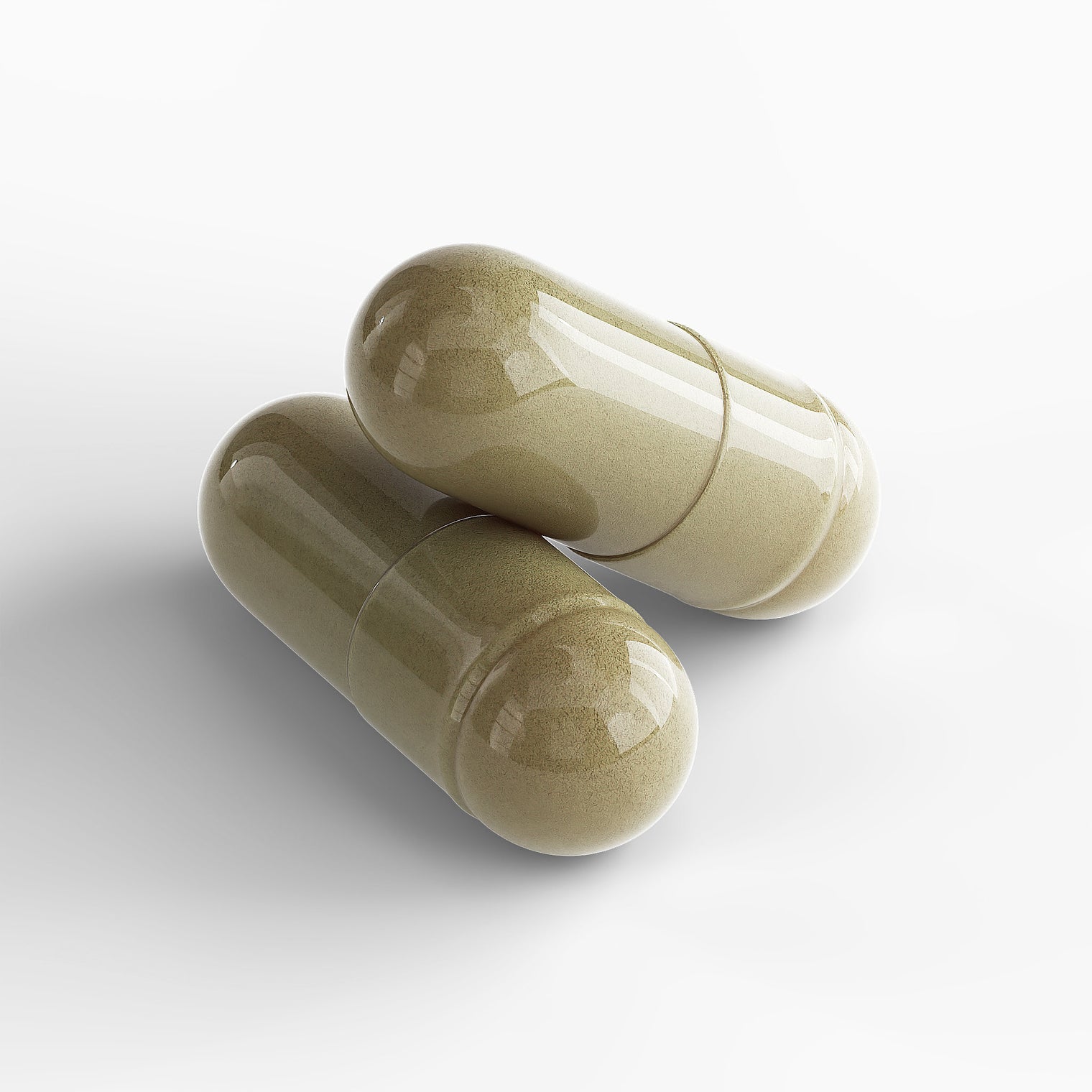 Close-up of a Thrive Hive Women's Vitality capsule, a blend of herbal extracts for women's health.
