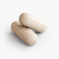 Close-up of a Thrive Hive Advanced Focus Formula capsule, a daily supplement for mental clarity.