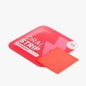 Close-up of a Cranberry-flavored oral strip from Thrive Hive's no-crash energy supplement.