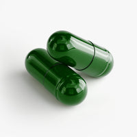 Close-up of a Thrive Hive Fat Attack Thermogenic Aid capsule, a metabolism booster.