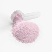 A scoop of Thrive Hive's electrolyte powder, providing essential nutrients for athletes and professionals.