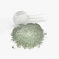 A scoop of Thrive Hive's electrolyte powder, providing essential nutrients for athletes and professionals.