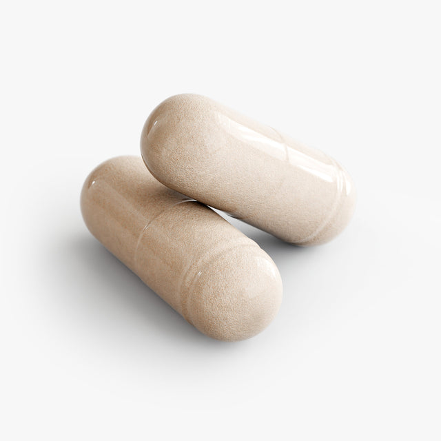 Close-up of a Thrive Hive Keto Support capsule, a fat burner with Raspberry Ketone and Green Tea.