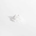 A scoop of white L-Glutamine powder from Thrive Hive's unflavored supplement.